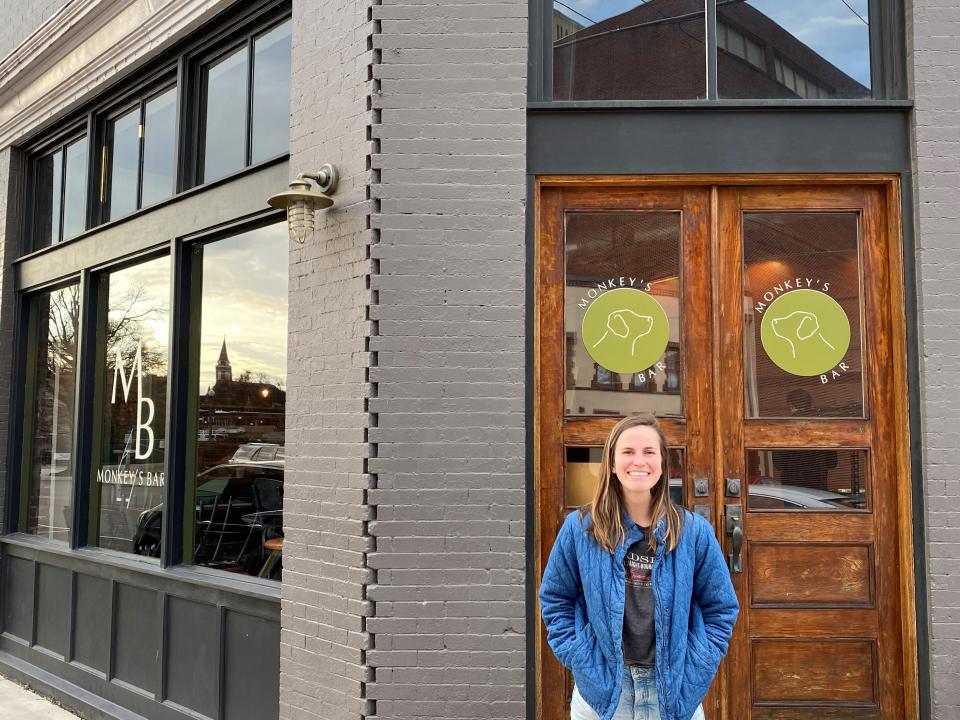 Monkey's Bar owner Elle Nelson poses for a photo outside of the 104 W. Depot Ave. location. The bar is now open.