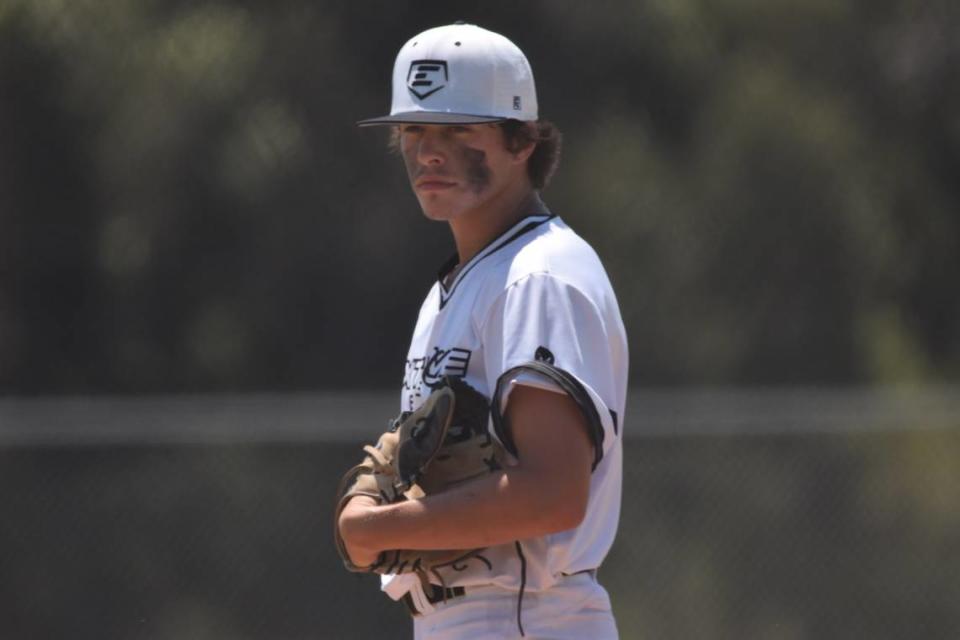 Highland High School graduate Blaise Pearson looks in for a sign while pitching for Lewis and Clark Community College this season. Pearson enjoyed a strong freshman campaign and now looks forward to his sophomore season pitching for the Trailblazers.