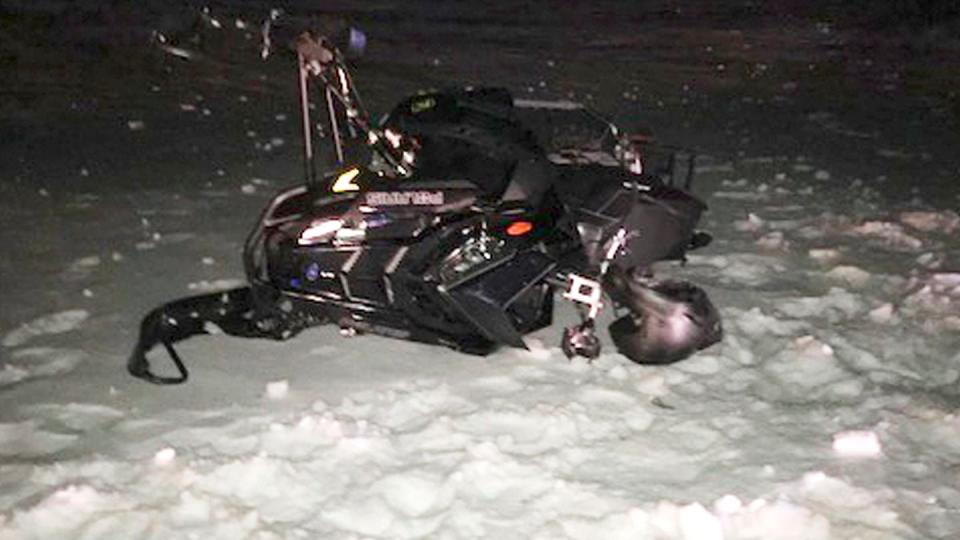 A damaged snowmobile which crashed with a Black Hawk helicopter, March 13, 2019, in Worthington, Mass.  (Army photo provided by attorney Douglas Desjardins/AP)