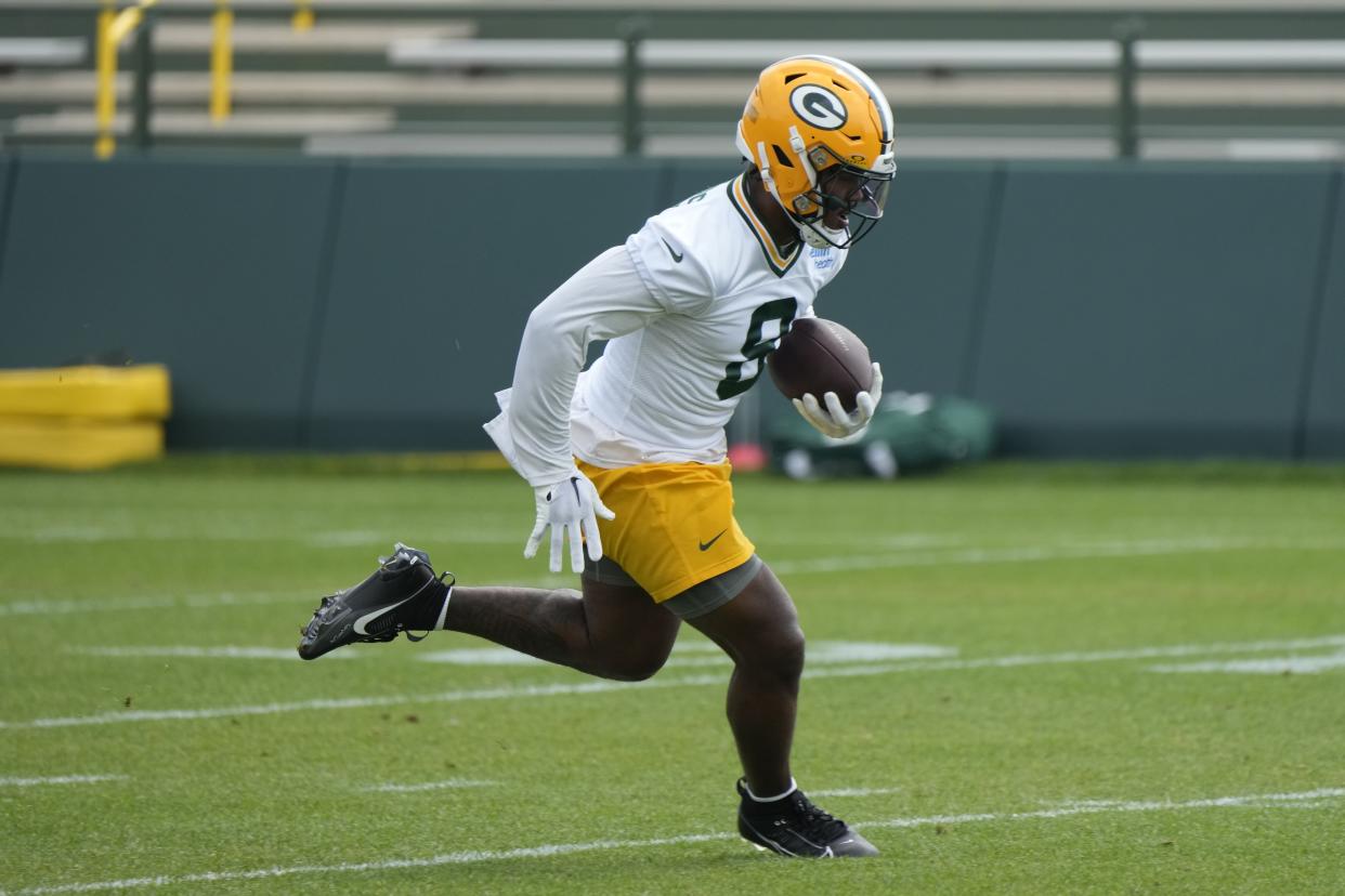 Green Bay Packers' Josh Jacobs runs during an NFL football practice session Tuesday, June 4, 2024, in Green Bay, Wis. (AP Photo/Morry Gash)