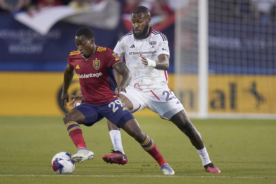 Real Salt Lake midfielder Anderson Julio (29) handles the ball against FC Dallas defender Sebastien Ibeagha (25) during the first half of an MLS soccer match Saturday, April 15, 2023, in Frisco, Texas. (AP Photo/LM Otero)