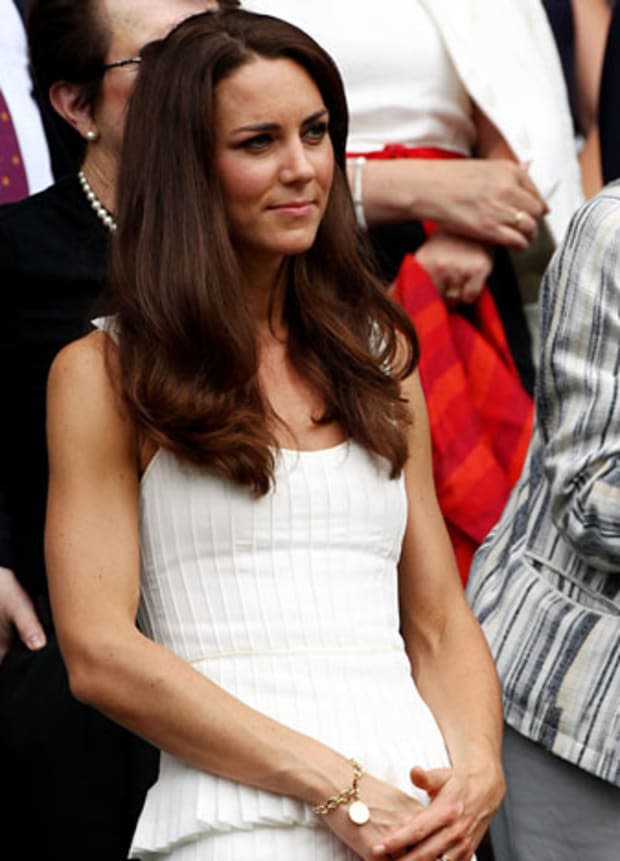 <p>All eyes were on Kate Middleton at Wimbledon as she watched the match in a pleated off-white ensemble, from Temperley London's Spring 2011 line.</p>
