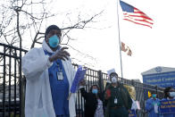 Wayne Malone speaks to the media as he joined registered nurses outside the Brooklyn Veterans Administration Medical Center, Monday, April 6, 2020, in New York, where workers called for more personal protective equipment (PPE) and staffing assistance to care for those affected by the current coronavirus outbreak. (AP Photo/Kathy Willens)