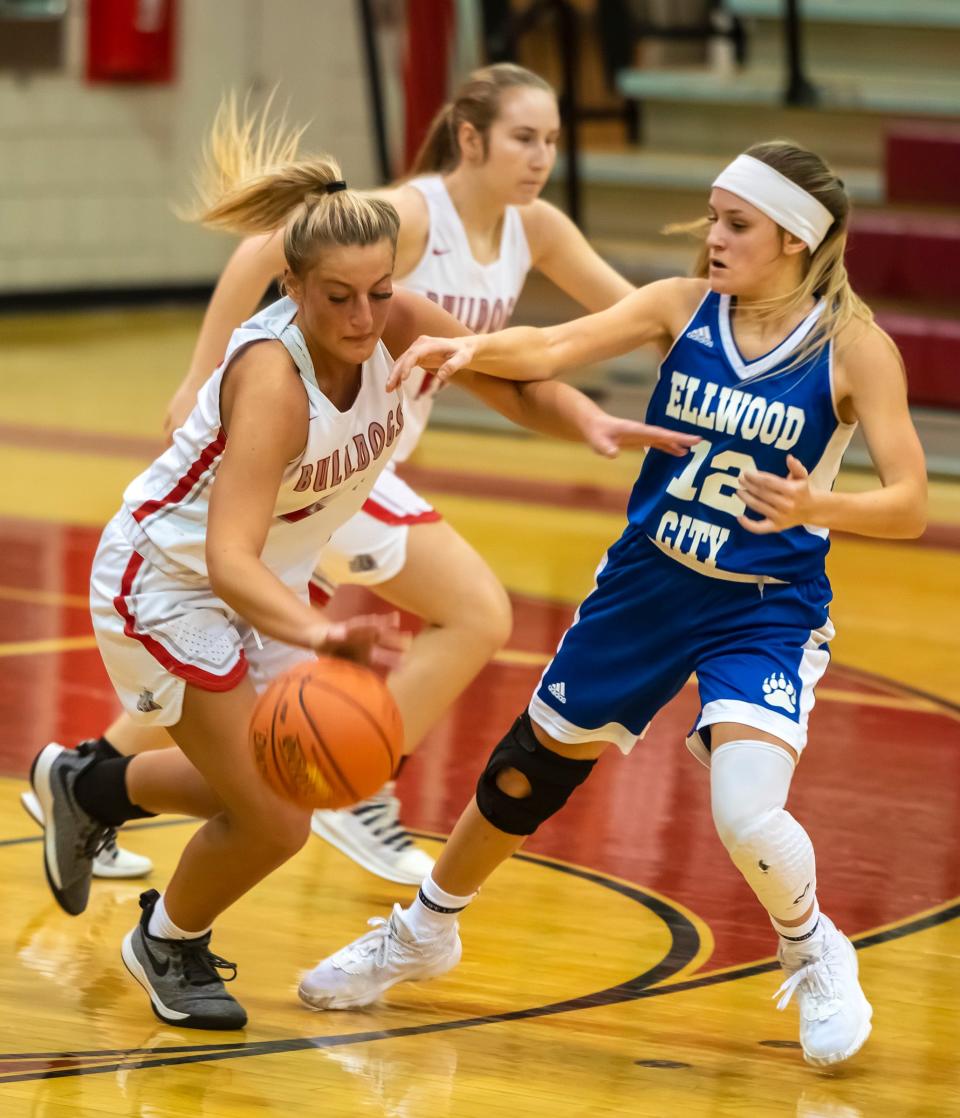 Ellwood City's Kyla Servick tries to slow down Freedom's Karissa Mercier in a game during the 2020-21 season.