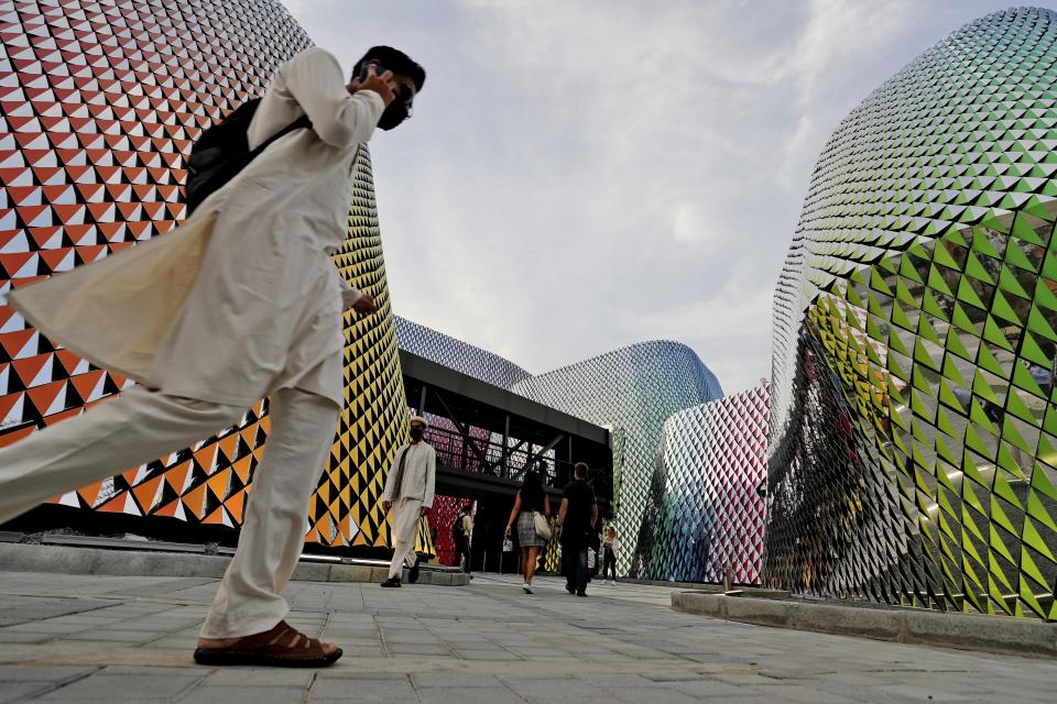 People visit the Pakistan pavilion at the Dubai Expo 2020, in Dubai, United Arab Emirates, Sunday, Oct. 3, 2021. (AP Photo/Kamran Jebreili)