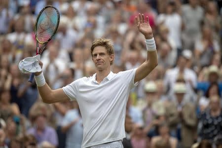 Jul 13, 2018; London, United Kingdom; Kevin Anderson (RSA) celebrates match point during his match against John Isner (USA) on day 11 at All England Lawn and Croquet Club. Mandatory Credit: Susan Mullane-USA TODAY Sports