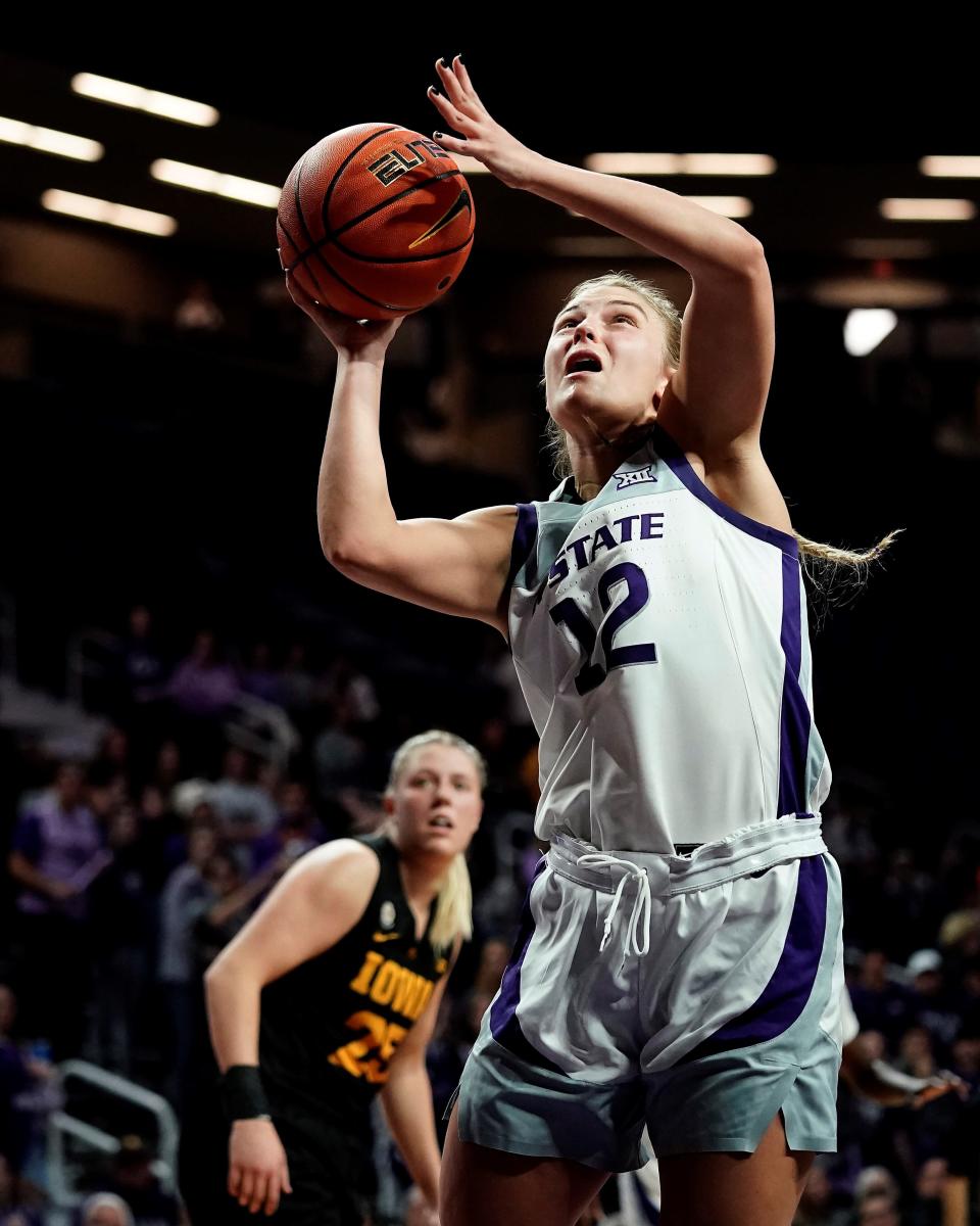 Kansas State guard Gabby Gregory (12) puts up a shot during the second half of an NCAA college basketball game against Iowa Thursday, Nov. 17, 2022, in Manhattan, Kan. Kansas State won 84-83. (AP Photo/Charlie Riedel)