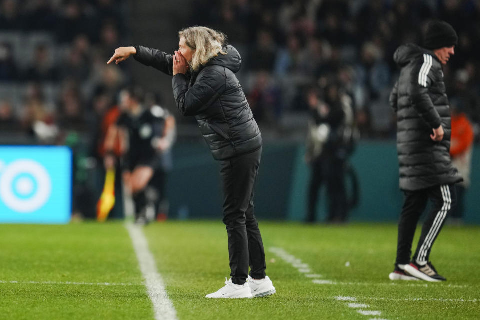 Norway's head coach Hege Riise, left, gives directions to her players near Philippines' head coach Alen Stajcic during the Women's World Cup Group A soccer match between Norway and Philippines at Eden Park stadium in Auckland, New Zealand, Sunday, July 30, 2023. Norway defeated Philippines 6-0. (AP Photo/Abbie Parr)