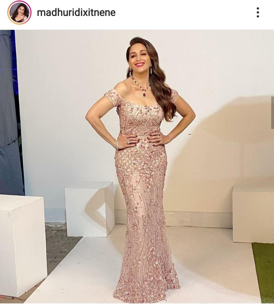 We wish her choice in western wear was even half as impressive as her taste in ethnics. The 90s <em>dhak-dhak </em>girl picked a shimmery floor-length gown to walk the red-carpet of the 65th Amazon Filmfare Awards. Though she was graceful and looked radiant, we feel that this off-shoulder attire is dated and takes us back to the 90s. We would love to see her step out of her comfort zone and experiment with bolder western designs.