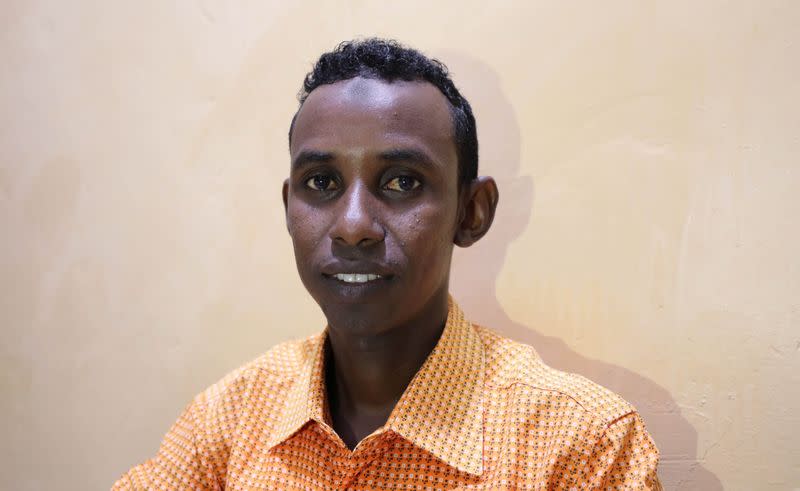Mohamed Omar Abukar, a Somali student, talks during an interview with Reuters after his mother and nieces were injured during an airstrike in Mogadishu