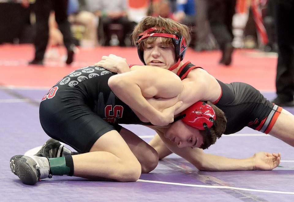 Branden Boggs of Sandy Valley has control of Casper Caizzo in their quarter final 106 pound matchup at the OHSAA State Tournament in Columbus Saturday, March 12, 2022.