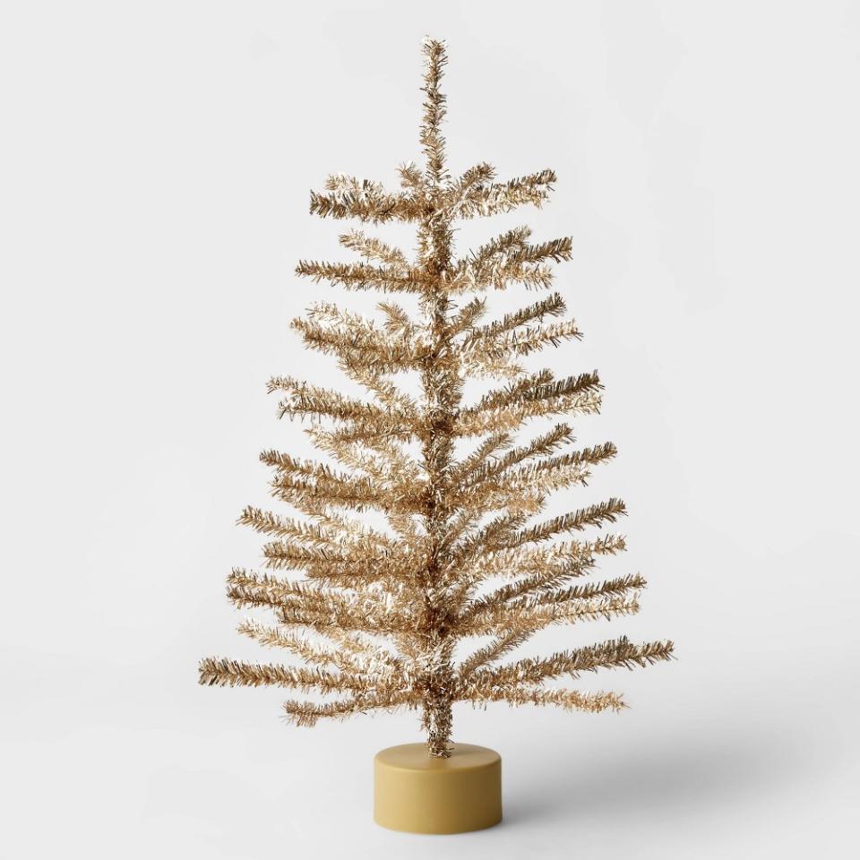 <p><a href="https://go.redirectingat.com?id=74968X1596630&url=https%3A%2F%2Fwww.target.com%2Fp%2F24-34-unlit-tinsel-mini-artificial-christmas-tree-champagne-gold-wondershop-8482%2F-%2FA-85378456&sref=https%3A%2F%2Fwww.cosmopolitan.com%2Flifestyle%2Fg45886713%2Fbest-small-christmas-trees%2F" rel="nofollow noopener" target="_blank" data-ylk="slk:Shop Now;elm:context_link;itc:0;sec:content-canvas" class="link ">Shop Now</a></p><p>24-Inch Tinsel Mini Artificial Christmas Tree </p><p>target.com</p><p>$10.00</p>