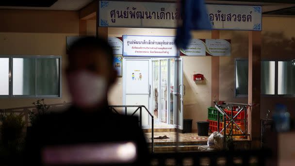 PHOTO: A police officer stands outside a day care center which was the scene of a mass shooting, in the town of Uthai Sawan, in the province of Nong Bua Lam Phu, Thailand, Oct. 6, 2022.  (Athit Perawongmetha/Reuters)