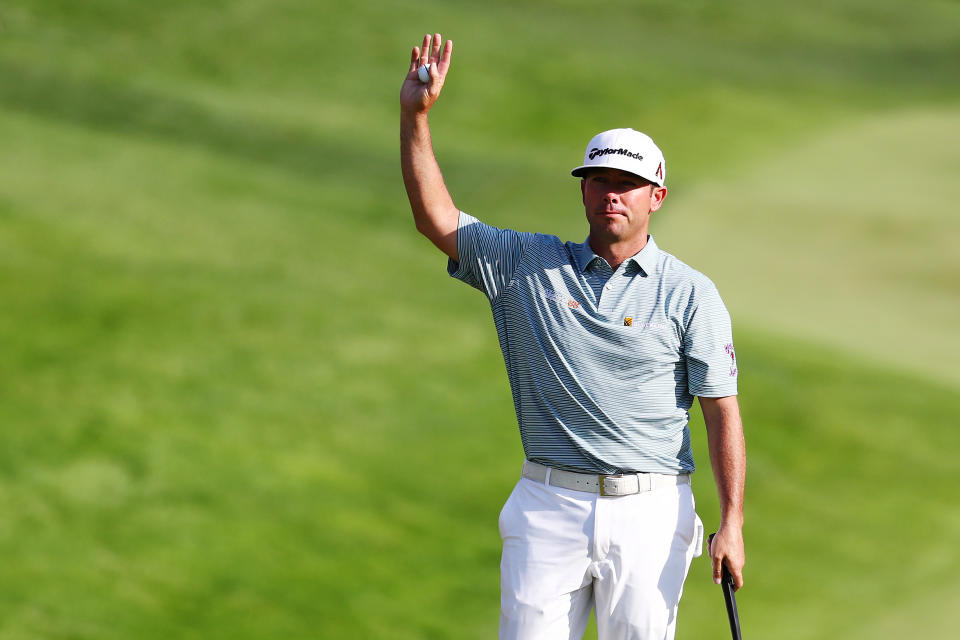 Chez Reavie celebrates on the 18th green after making a par to win the Travelers Championship at TPC River Highlands on June 23, 2019 in Cromwell, Connecticut.