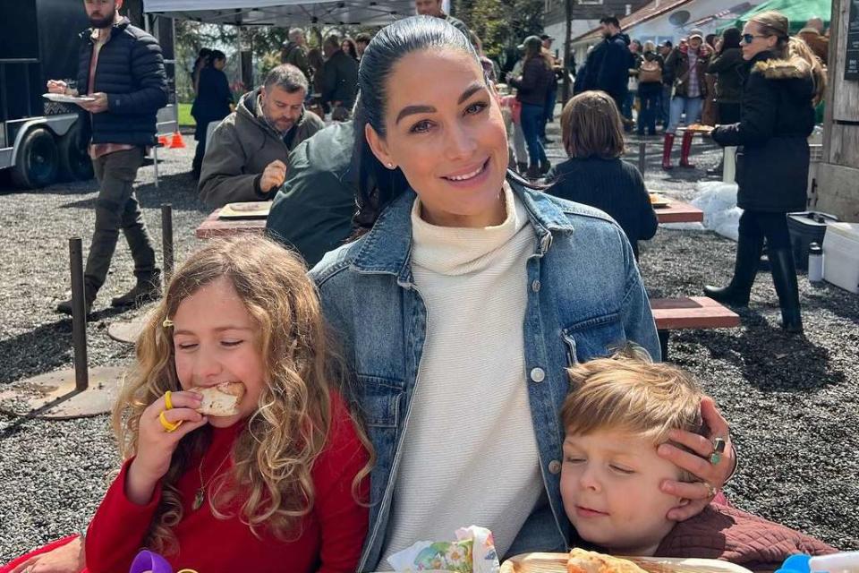 <p>Brie Garcia/ Instagram</p> Brie Garcia smiles with kids Birdie and Buddy on Easter.