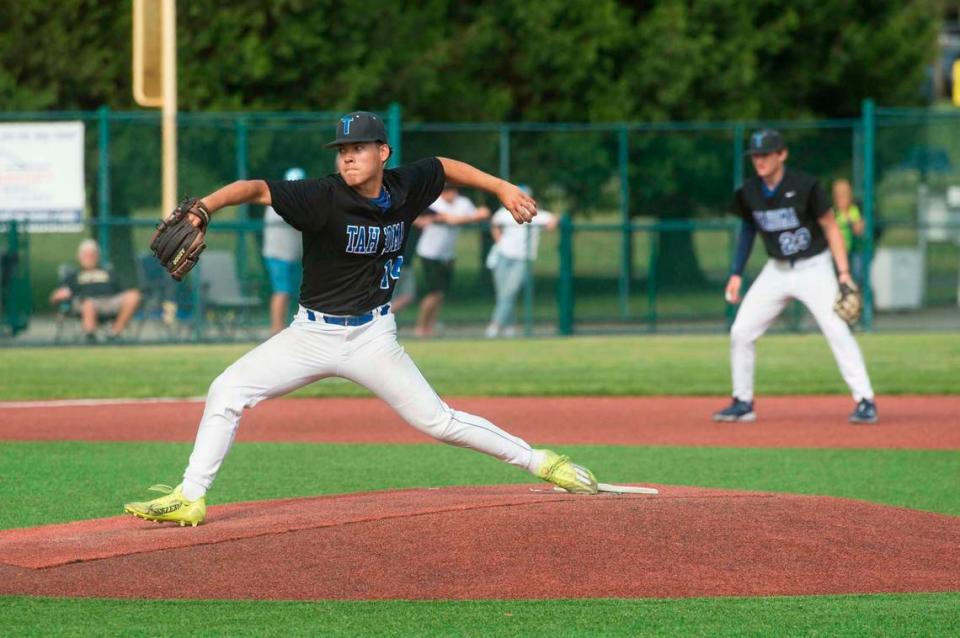 Tahoma starter Adam Jay (14) throws a pitch in a baseball game against Olympia in the Class 4A state quarterfinals on Saturday, May 20, 2023 at the Regional Athletic Complex in Lacey, Wash.