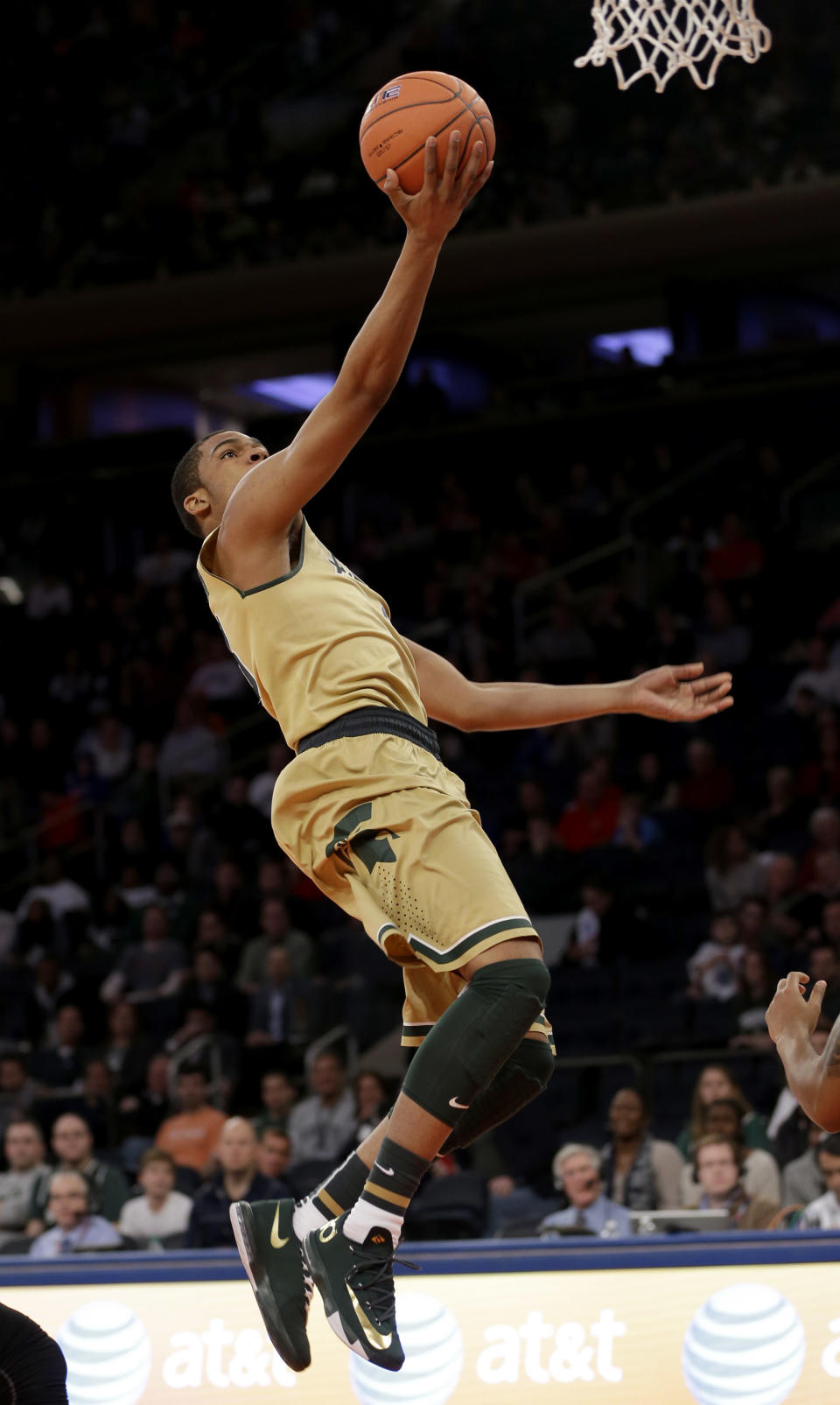 Michigan State's Alvin Ellis III scores during the first half of an NCAA basketball game against Georgetown at Madison Square Garden, Saturday, Feb. 1, 2014, in New York. (AP Photo/Seth Wenig)