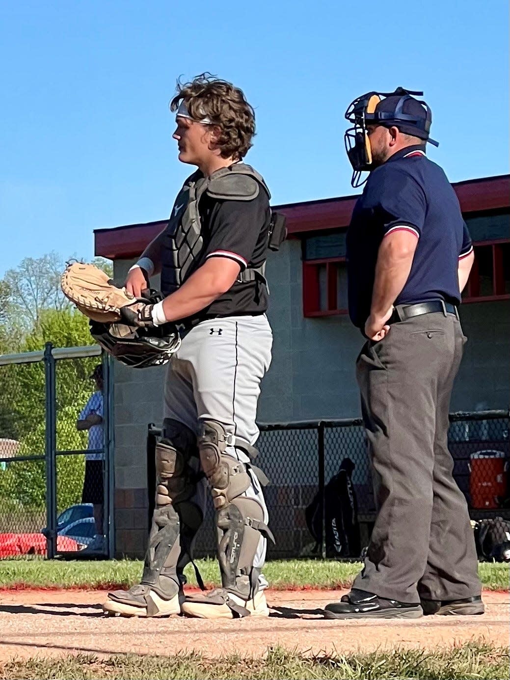 Marion Harding catcher Lucas Keller gets set before the start of an inning at Pleasant on Tuesday