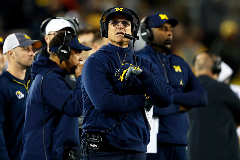 Michigan coach Jim Harbaugh denied having knowledge of any 