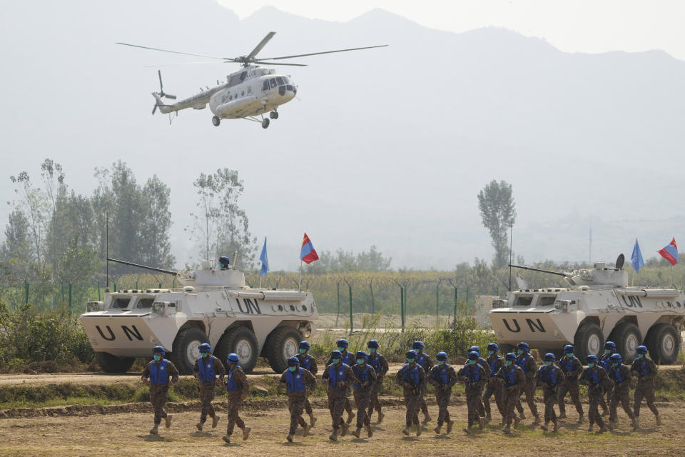 United Nations troops from Mongolia take part in the Shared Destiny 2021 drill at the Queshan Peacekeeping Operation training base in Queshan County in central China's Henan province Wednesday, Sept. 15, 2021. Peacekeeping troops from China, Thailand, Mongolia and Pakistan took part in the 10 days long exercise that field reconnaissance, armed escort, response to terrorist attacks, medical evacuation and epidemic control. (AP Photo/Ng Han Guan)