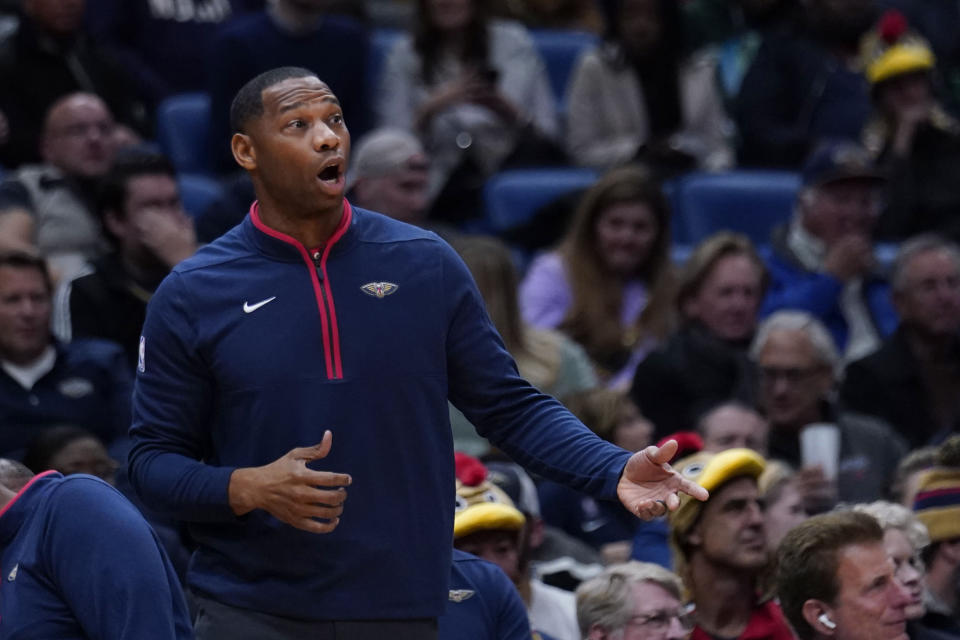 New Orleans Pelicans head coach Willie Green calls out from the bench in the first half of an NBA basketball game against the Boston Celtics in New Orleans, Friday, Nov. 18, 2022. (AP Photo/Gerald Herbert)