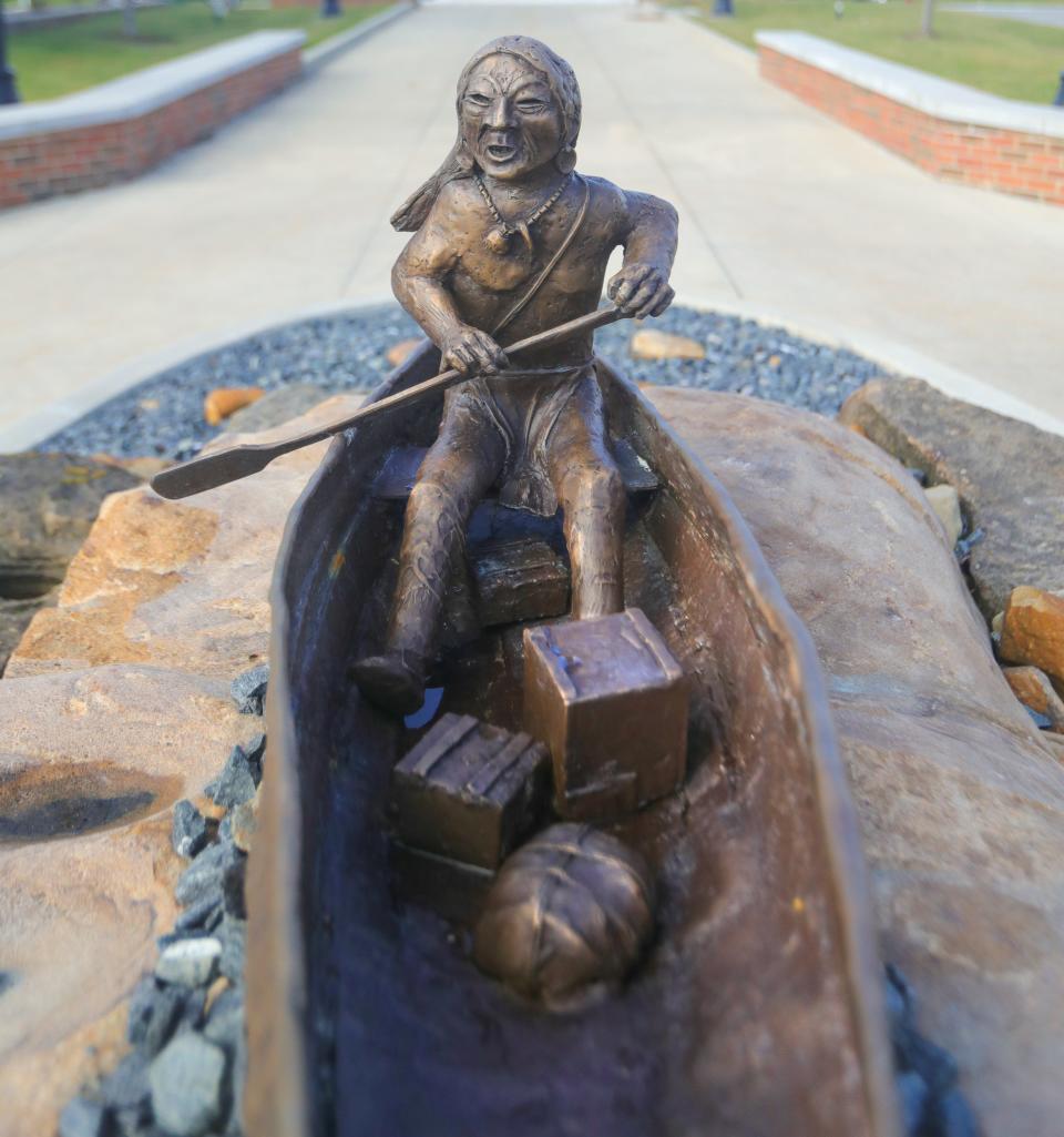 Peter Jones' sculpture "River Trade" depicts the exchange of goods among indigenous people along the Cuyahoga River.