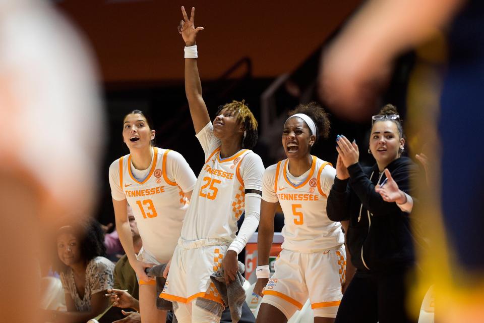 Tennessee guard Jordan Horston (25), Tennessee guard/forward Justine Pissott (13) and Tennessee guard Kaiya Wynn (5) celebrate a point during a game between Tennessee and Chattanooga at Thompson-Boling Arena in Knoxville, Tenn., on Tuesday, Dec. 6, 2022.