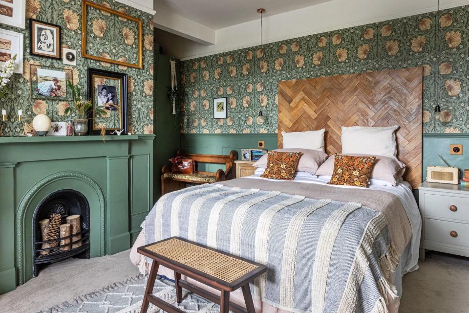main bedroomn with patterned wallpaper