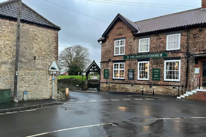 The entrance to Stather Road, as seen from the High Street, Burton upon Stather. The road widens further down, but it is steep and narrow at its start