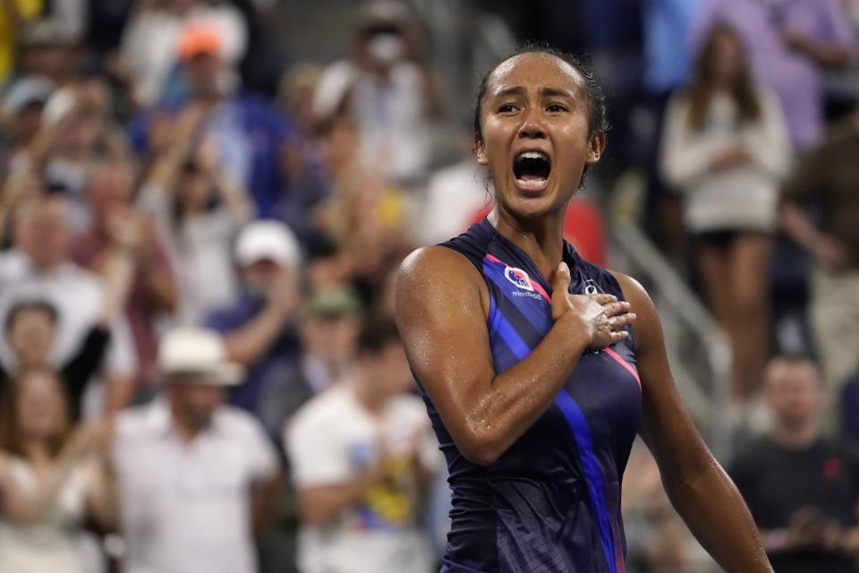 Leylah Fernandez reacts after defeating Angelique Kerber.