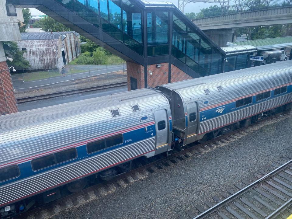 amtrak cars on track external shot