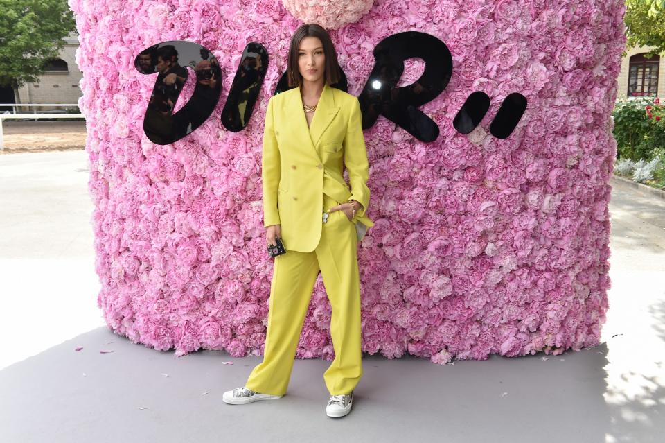 <p>WHO: Bella Hadid</p> <p>WHAT: Dior Homme by Kim Jones</p> <p>WHERE: At the Dior Homme Spring/Summer 2019 show, Paris</p> <p>WHEN: June 23, 2018</p>