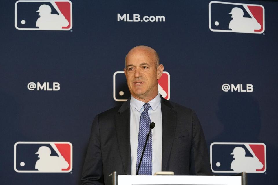 Athletics owner John Fisher speaks during a news conference in Arlington, Texas, in November.