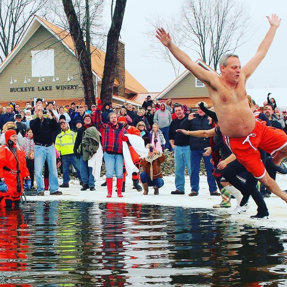An eager (and chilly) Winterfest visitor takes the Polar Plunge.