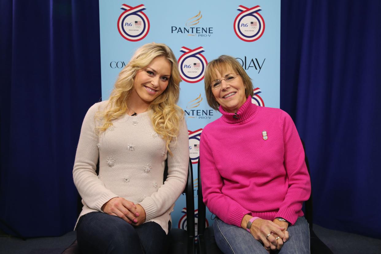 Lindsey Vonn in a neutral sweater sitting next to her mother Lindy in a pink sweater