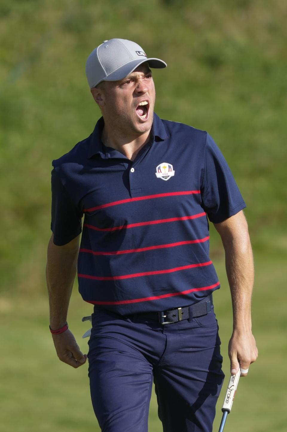 FILE - Team USA's Justin Thomas reacts to his birdie putt during a four-ball match the Ryder Cup at the Whistling Straits Golf Course Friday, Sept. 24, 2021, in Sheboygan, Wis. Thomas is a captain's pick for the 44th Ryder Cup outside Rome on Sept. 29-Oct. 1.(AP Photo/Charlie Neibergall, File)