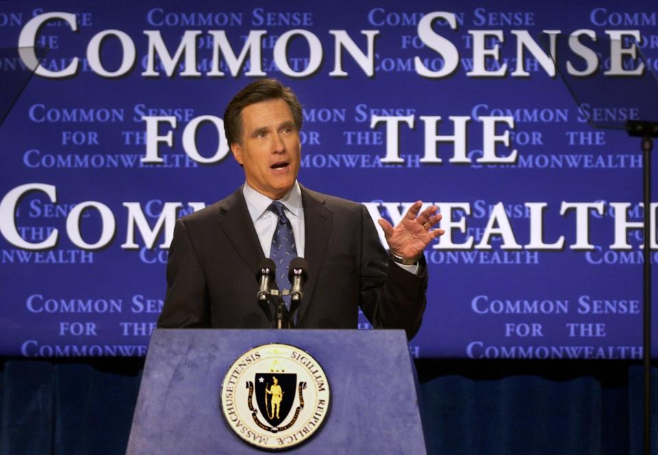 FILE - In this Feb. 25, 2003, file photo, then-Massachusetts Gov. Mitt Romney delivers his State of the State address in Boston. What worked in the corporate boardroom for Mitt Romney didn't fly in the more raucous corridors of the Massachusetts Legislature. The Republican took over as governor in 2003 after a long, successful career as CEO at private equity firm Bain Capital, where it was pretty much Romney's way or the highway. (AP Photo/Elise Amendola, File)