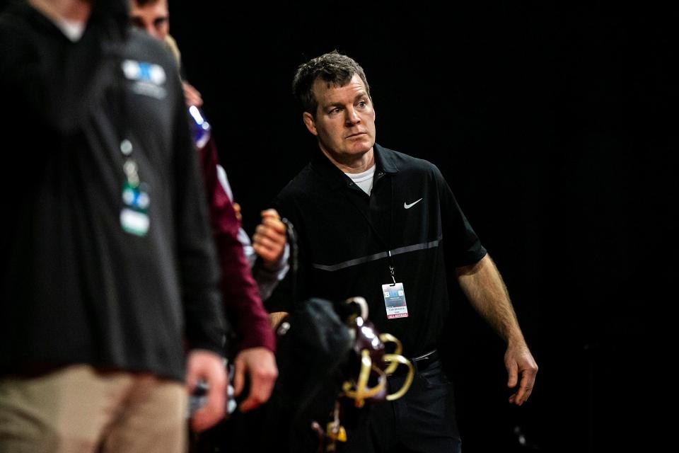 Iowa head coach Tom Brands watches a match during the first session of the Big Ten Wrestling Championships, Saturday, March 5, 2022, at Pinnacle Bank Arena in Lincoln, Nebraska.