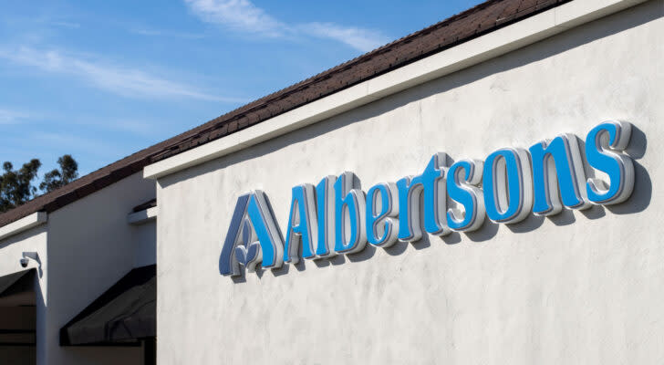 ACI stock: the Albertsons logo on the side of a building.