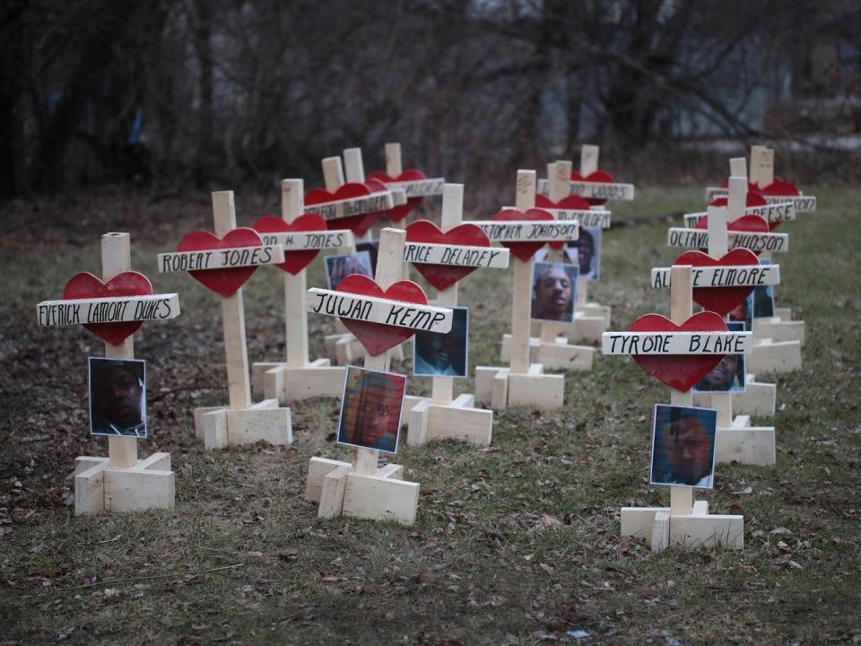 A series of crosses, each representing a murder victim, built by carpenter Greg Zanis in Englewood, Chicago. Crosses for Losses is Zanis's campaign to highlight murder rates in the US (Getty)