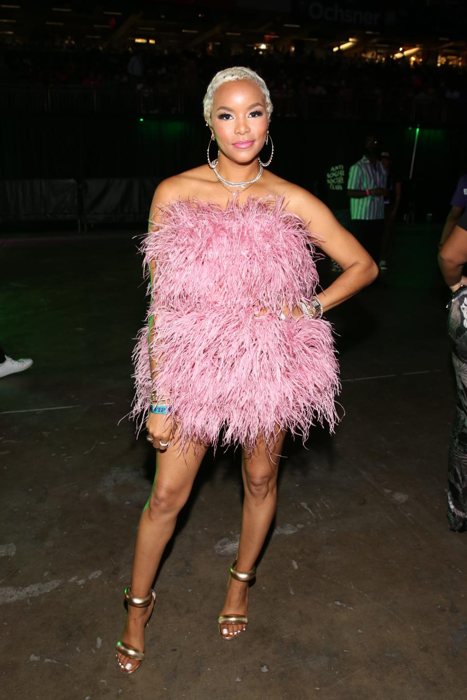 LeToya Luckett in a pink feather dress and silver heels