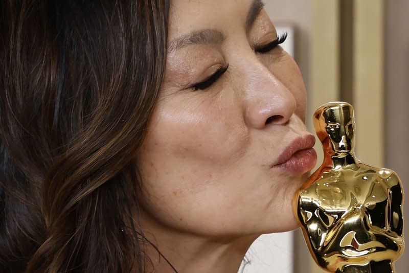 Michelle Yeoh, winner of the award for Best Actress in a Leading Role for "Everything Everywhere All at Once," appears backstage with her Oscar during the 95th annual Academy Awards at Loews Hollywood Hotel in the Hollywood section of Los Angeles on March 12. File Photo by John Angelillo/UPI