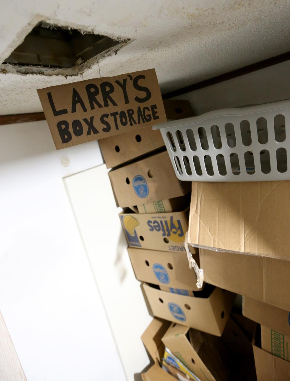 A sign shows the area where boxes are stored for residents who need them Thursday, Feb. 9, 2023, at Motels4Now at the Knights Inn on Lincoln Way West in South Bend.