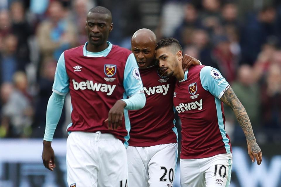 <p>West Ham United’s Manuel Lanzini (R) celebrates scoring their first goal with Andre Ayew (C) </p>