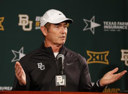 Baylor NCAA college head football coach Art Briles responds to questions during a press conference Sunday, Dec. 7, 2014, in Waco, Texas. After weeks of talk about whether Baylor or TCU deserved to be in the playoff, neither made it Sunday, and the Big 12 may be reconsidering how to declare its champion. (AP Photo/Waco Tribune Herald, Rod Aydelotte)