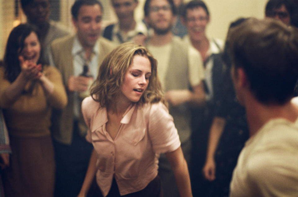 This undated publicity film image released by IFC Films/Sundance Selects shows Kristen Stewart, center, as Marylou/LuAnne Henderson in a scene from the film, "On the Road," directed by Walter Salles. (AP Photo/IFC Films/Sundance Selects, Gregory Smith)