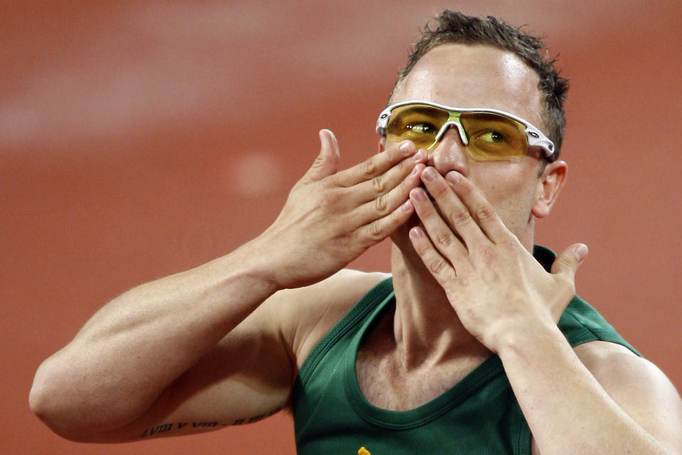 South Africa's Oscar Pistorius celebrates after winning the gold medal in the athletics men's 400M T44 finals at the Beijing 2008 Paralympic Games September 16, 2008. REUTERS/Claro Cortes IV (CHINA) - RTR21Y1N