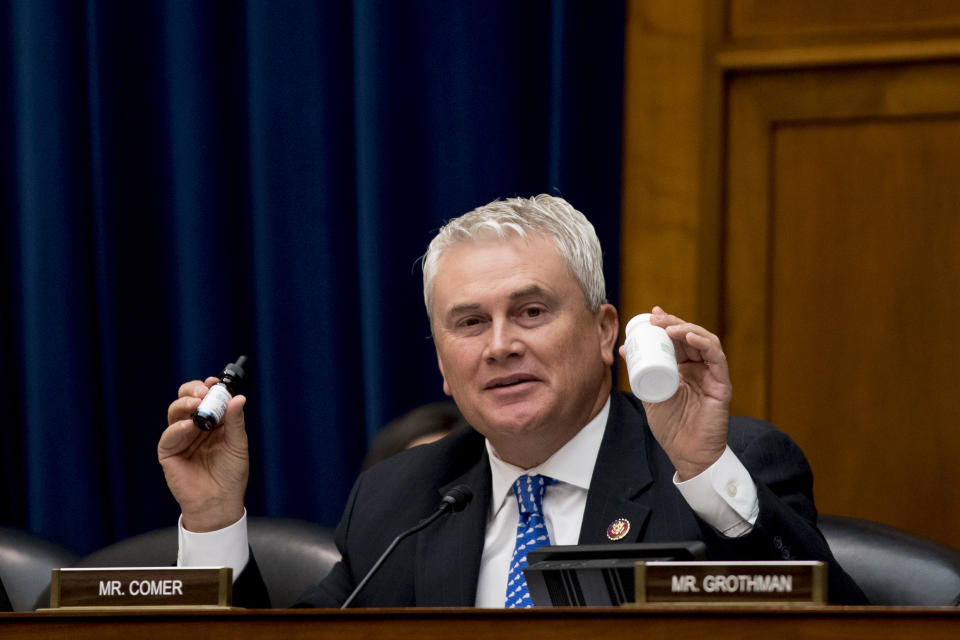 Rep. James Comer, R-Ky., holds up what he identified as CBD products as he questions CDC Principal Deputy Secretary Dr. Anne Schuchat as she appears before a House Oversight subcommittee hearing on lung disease and e-cigarettes on Capitol Hill in Washington, Tuesday, Sept. 24, 2019. (AP Photo/Andrew Harnik)