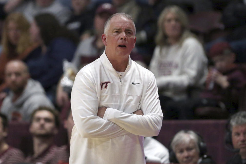Virginia Tech coach Mike Young watches play during the first half of the team's NCAA college basketball game against Campbell on Wednesday, Nov. 15, 2023, in Blacksburg, Va. (Matt Gentry/The Roanoke Times via AP)