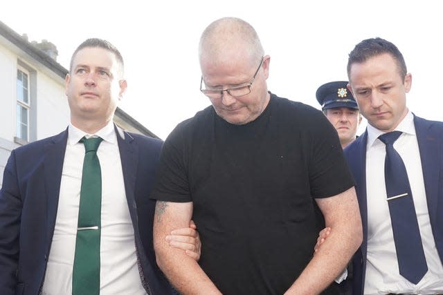 Richard Satchwell (centre) arrives at the District Court in Cashel, Co Tipperary 